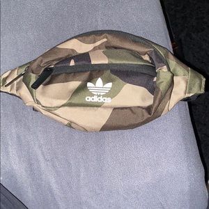 Army green adidas fannyback.
